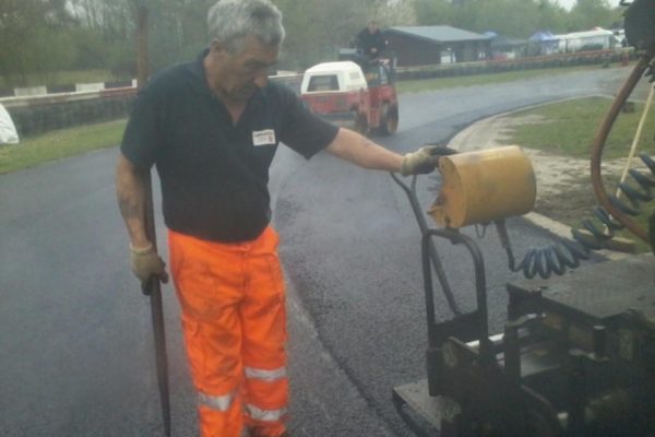 workers laying road at 3 Sisters Race Track Ashton in Makerfield