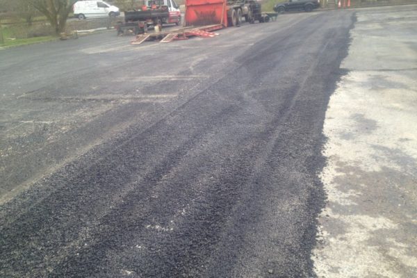 workers fixing road at Christ Church Parbold