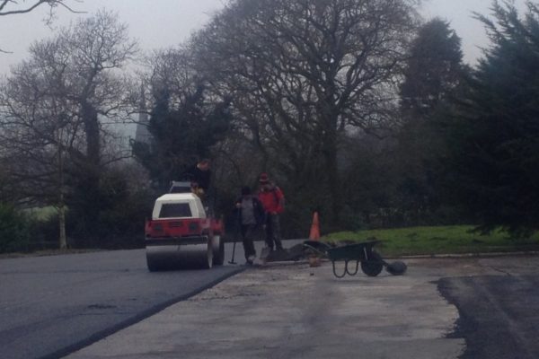 workers on road at Christ Church Parbold