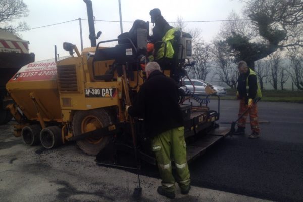 workers sorting road at Christ Church Parbold
