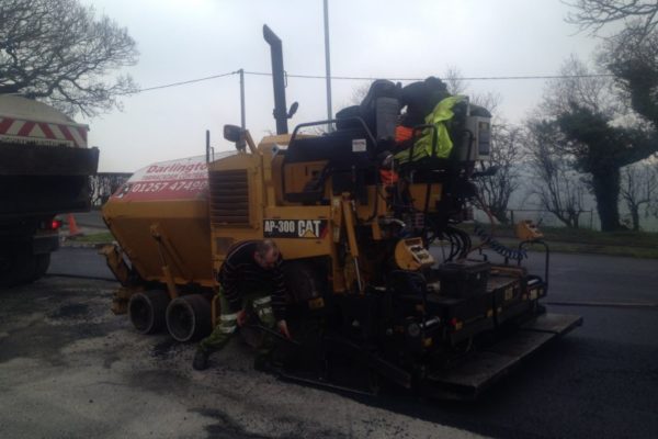 workers working on road at Christ Church Parbold