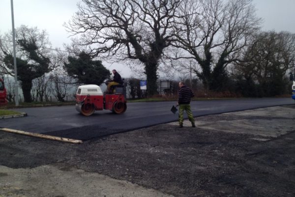 Workers laying road and car park at Christ Church Parbold