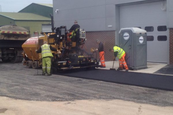 workers laying new car park